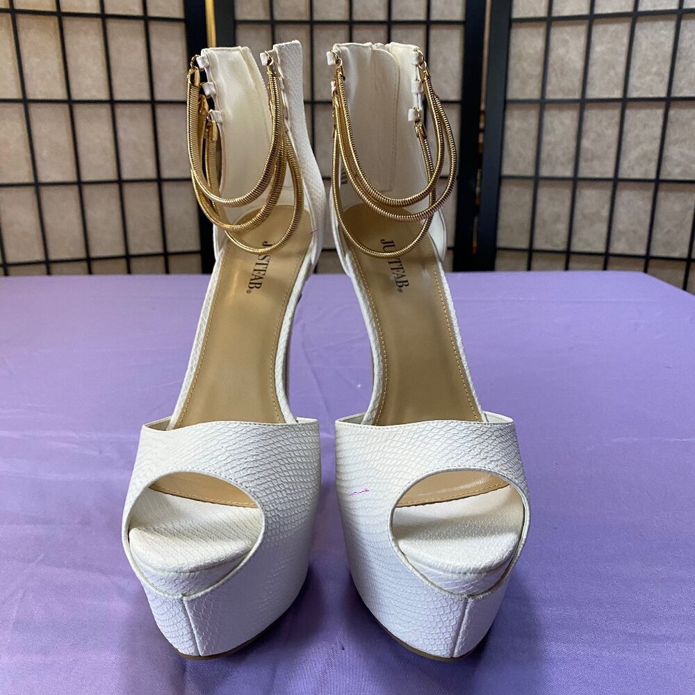 WILD White snakeskin sky high platform pumps with gold accent straps